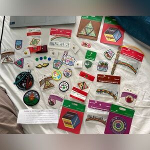 Huge lot of Vintage Girl Scout badges, discs and pins 40 iron on badges - NEW